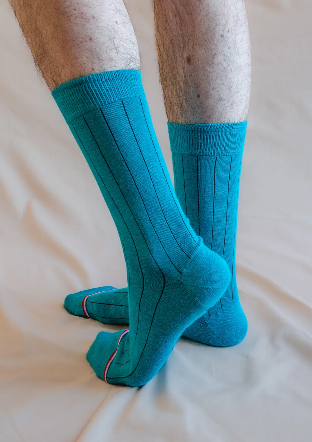 chaussette bleu canard signée clovis